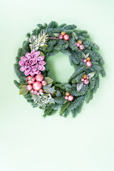 Cristmas wreath garland decorations isolated on green background