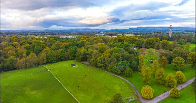 Aerial Hyper-Lapse video of Heaton Park at Prestwich/Greater Manchester showing fast moving clouds and people. 