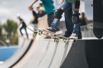 Two skateboarders performing tricks simultaneously. - obrazy, fototapety, plakaty