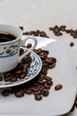 cup of coffee with beans