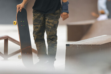 Skater descending a ramp, full focus.