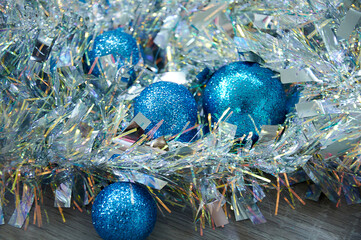 Blue Christmas balls in silver tinsel. Christmas background