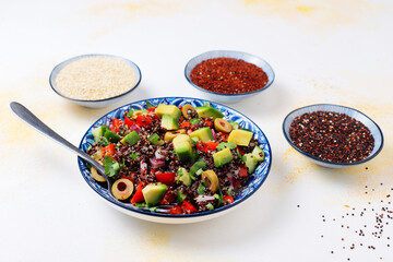 Quinoa salad with olives,avocado,cherry tomatoes,onion,green.