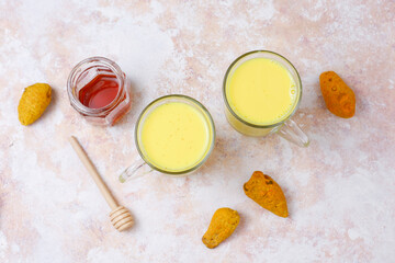 Moon milk for better sleep. Turmeric Golden milk with cinnamon, honey.