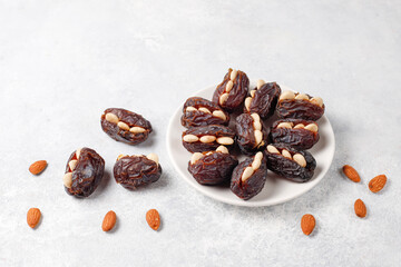 Fresh organic and various sweet dried date fruits.