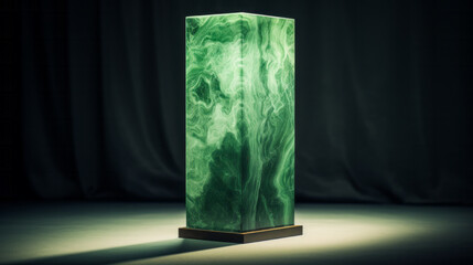 A decorative green vase displayed on a sturdy wooden pedestal