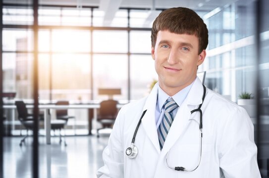 Portrait of happy doctor man posing in hospital, AI generated image