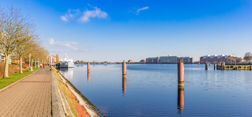 Panorama of a historic ship at the quay of the canal in Wilhelmshaven, Germany