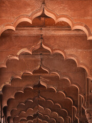 Arches inside the Diwan-i-Am hall in the historic Red Fort (Lal Qila) in Old Delhi, India. 
