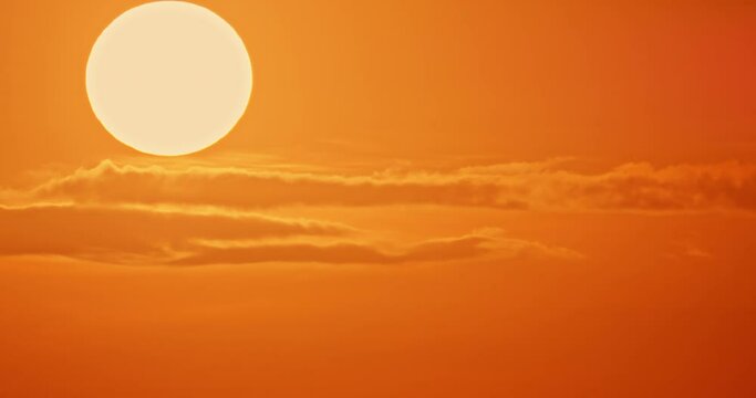 Sunset timelapse, close up of big sun setting clear red sky, beautiful nature background time laps, timelaps video backgoung, sundown laps.