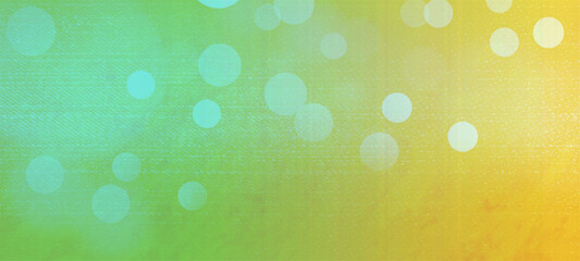 Green, yellow bokeh widescreen for holidays and new year backgrounds, Usable for banner, poster, Ad, events, party, sale, celebrations, and various design works