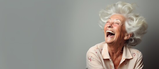 A loud laugh comes from an older woman in Europe - obrazy, fototapety, plakaty
