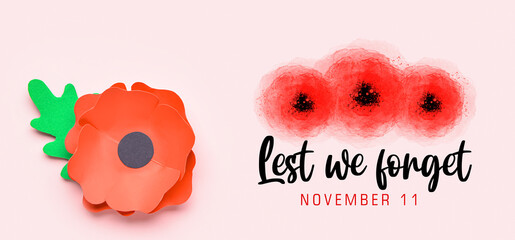 Paper poppy flower on light background. Remembrance Day in Canada