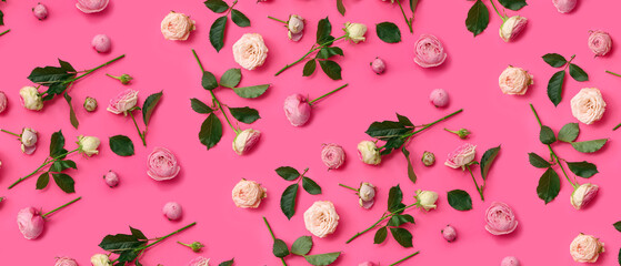 Many beautiful roses on pink background. Pattern for design