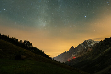 Milky Way over Mont Blanc Mountain. Starry Sky. Night Landscape. View from Italy