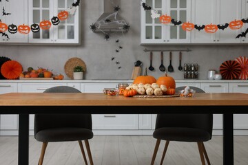 Stylish kitchen interior with festive decor. Halloween celebration