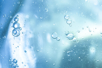 Air bubbles in the water background.Abstract oxygen bubbles in the sea.Water bubbles isolate on blue background.