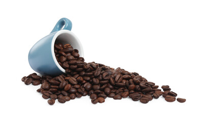 Coffee beans and overturned light blue cup isolated on white