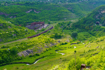 Fototapeta premium Picturesque green hilly valley. Background with selective focus and copy space