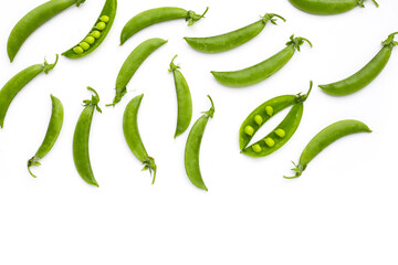 Fresh young green peas on white background.