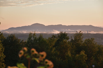 Orford mountain viewed from Sherbrooke city at sunset. Mountain profile.