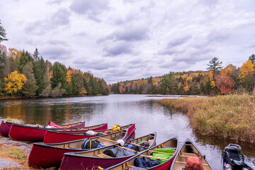 canoe trip on madawaska river ontario in fall with autumn color