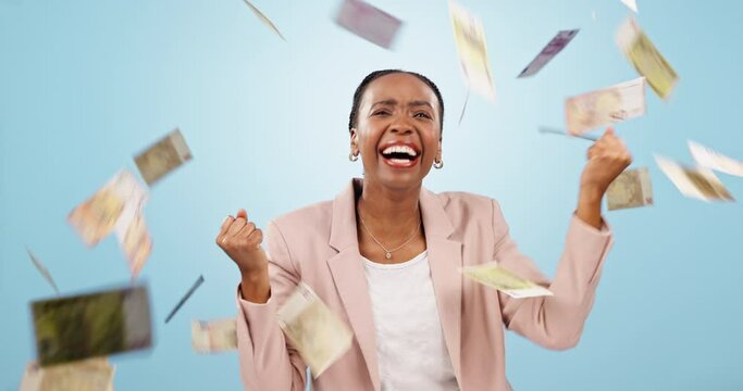 Money rain, financial freedom and excited black woman with wealth, cash and dancing isolated on blue background. Bonus, salary or income with lotto happy winner, dollar bills and cashback in studio
