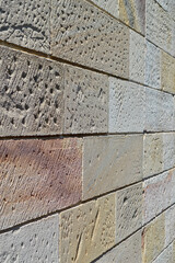 Sandstone blocks in an old wall in The Rocks area of Sydney, Australia