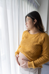 worried pregnant woman concerned and anxious woman in pregnancy overthinking worrying...