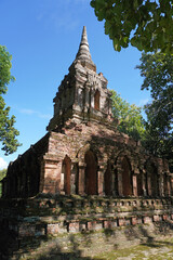 The ruins stupa (Chedi) of Wat Pa Sak, Buddhist temple-monastery in Chiang Saen District, Chiang Rai Province, Thailand.