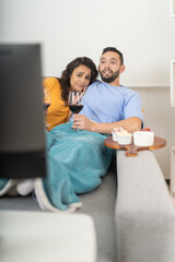 Fototapeta premium Lovers during an horror movie night at home