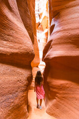 Young girl exploring Antilope Canyon in Arizona. Antilope canyon the most beautiful canyon in USA