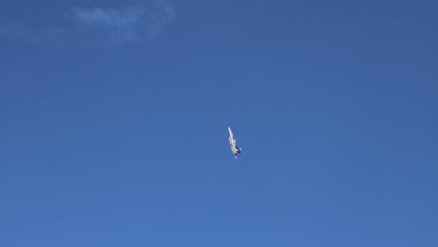 People watching an impressive F-18 Super Hornet display at the Gold Coast Pacific Airshow in Queensland, Australia.