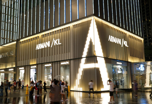 Tourists passing by Armani Store in KLCC in Kuala Lumpur, Malaysia on August 5, 2022