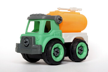 DIY plastic towing truck toy isolated on white background