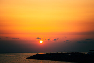Fototapeta premium A beautiful Öland sunset, with colorful skies and the setting sun over calm waters