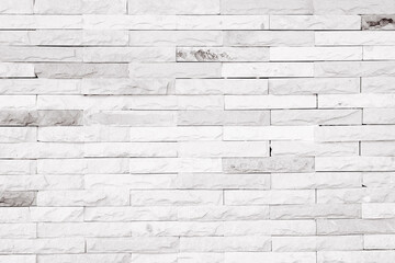 Detail of a white brick wall texture and background with copy space