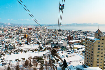 Beautiful landscape and cityscape from Hakodate Mountain with Snow in winter season. landmark and popular for attractions in Hokkaido, Japan.Travel and Vacation concept