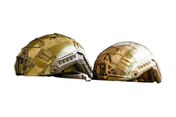 The soldier's helmet from the khaki military uniform set, as seen in the army clothing store, isolated on white background.