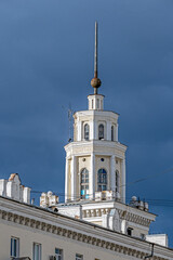 Fragment of the facade of a historic building on an autumn day