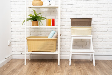 Plastic storage baskets in a bathroom interior