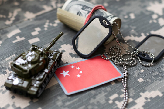 army blank, dog tag with flag of china on the khaki texture background. military concept