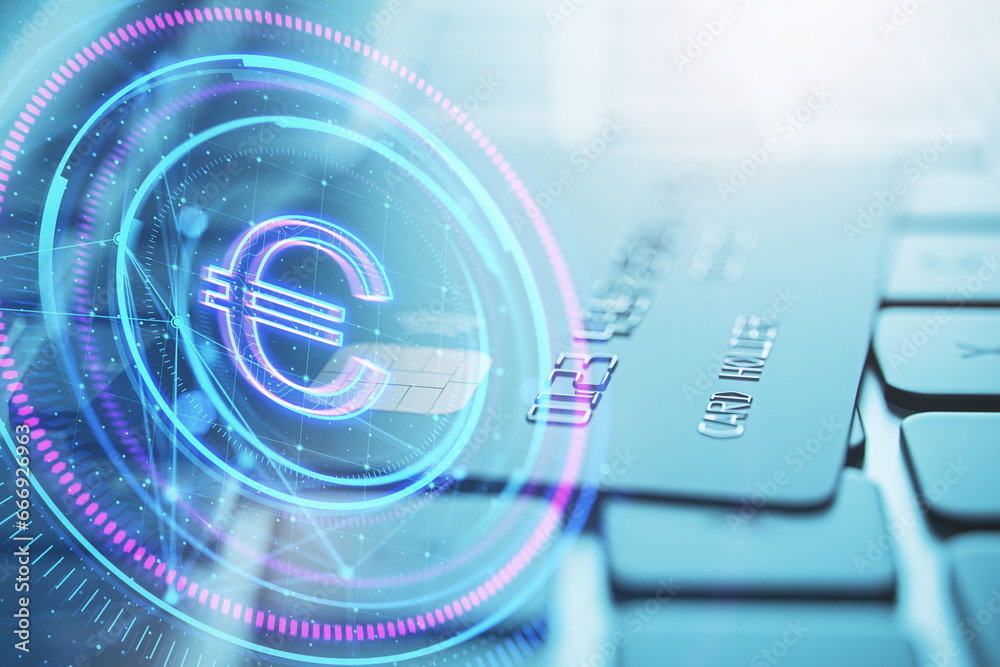 Poster close up of laptop keyboard with bank card and glowing round polygonal button with euro sign on blur