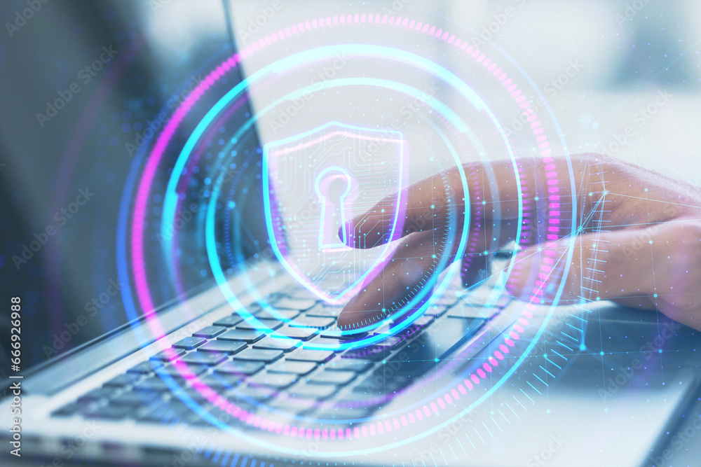 Poster Close up of hand using laptop keyboard on desktop with digital round polygonal padlock button on blurry background. Secure, safety and web protection concept. Double exposure.