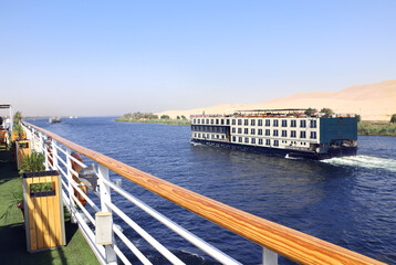 Fototapeta premium Cruise ship on the Nile river, Egypt, Africa. Luxury Nile Cruise. Summer vacation, relaxing on cruise ships