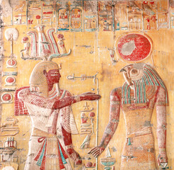 Ancient Colorful Mural Wall Painting inside Hatshepsut Temple in Valley of the Kings, Luxor, Egypt....