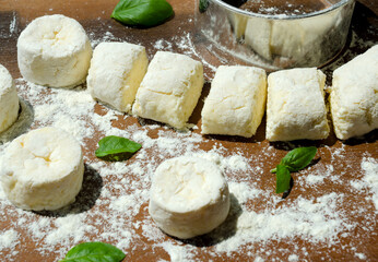 Homemade cheesecakes are ready for baking.