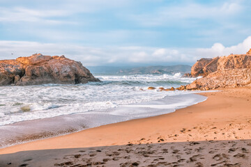 Beautiful landscape, sandy shore of the North Pacific Ocean near Sutro Baths in San Francisco, USA with a view of the Seal Rocks