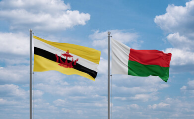 Madagascar and Brunei flags, country relationship concept