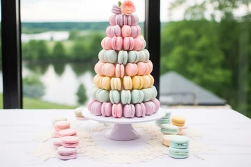 Fototapete Macarons a macaron tower wedding cake in pastel colors